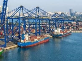 Photo shows container vessels at a terminal of the Haikou Port, south China's Hainan province. (Photo by Yang He/People's Dialy Online)