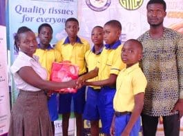 Pupils Of The Lord S Academy Preparatory School Receiving Their Souvenirs From One Of The Teachers