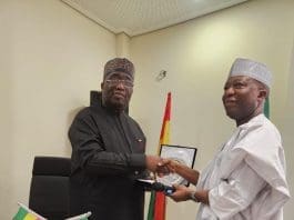 Hon Joe Ghartey Left In A Handshake With Prof Abubakar O Sulaiman