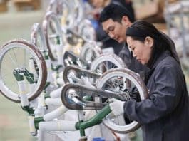 Bikes Are Manufactured In A Workshop Of A Factory In Pingxiang County