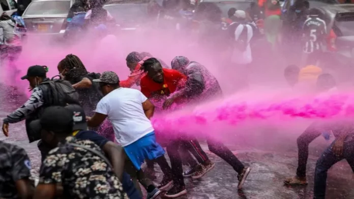 Kenyan Youth Hit With Water Cannons