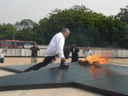 President About To Touch The Perpetual Flame Lit In Honour Of The Fallen Heroes Of The Revolution