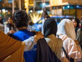 SOLA students are escorted by IOM staff members to ensure their safety during travel. Photo: Robert Kovacs/IOM 2024