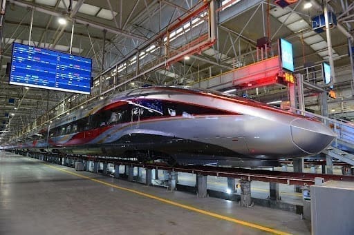 A Fuxing bullet train awaits maintenance in Xi'an, northwest China's Shaanxi province. (Photo by Tang Zhenjiang/People's Daily Online) A Fuxing bullet train awaits maintenance in Xi'an, northwest China's Shaanxi province. (Photo by Tang Zhenjiang/People's Daily Online)