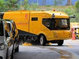 An autonomous driving sanitation vehicle developed by Chinese smart mobility company WeRide works on a street in Singapore. (Photo from the official website of WeRide)