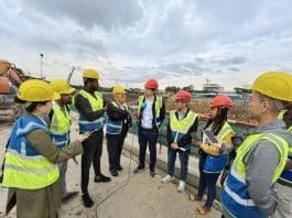 A joint interview is conducted by Chinese and Ethiopian media at the construction site of Ethiopian Airlines Group's future headquarters. (Photo by Ren Yan/People's Daily)