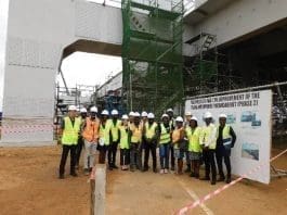 A cross section of journalists, engineers and officials from JICA and the Embassy of Japan