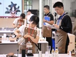 Participants compete at a barista skills competition held in Kunshan, east China's Jiangsu province, Aug. 31, 2024. (Photo by Yuan Xinyu/People's Daily Online)