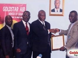 Current Deputy Director General Mr. Daniel Acquah-extreme right, former Deputy Director General of Ghana Civil Aviation Authority, Mr. Martey Boye Atoklo-third, presenting the Air Carrier Licence to CEO of Goldstar Air, Mr. Eric Bannerman-fourth. The rest are staff of Goldstar Air and Ghana Civil Aviation Authority