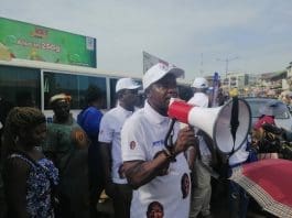 Dep.CEO of PBC, Alfred Ofori Annye with public Address System at Kumasi Kejetia Campaigning