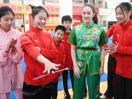 American and Chinese young people exchange martial arts skills in Fuzhou, southeast China's Fujian Province, Dec. 28, 2024. Young people from China and U.S. attended a martial arts cultural exchange event here on Saturday. (Xinhua/Lin Shanchuan)