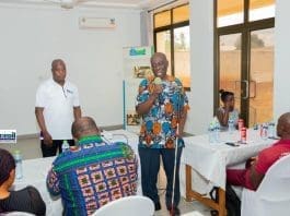 Mr. Yaw Debrah (with mic), Chairman for the Council for PWDs, made the announcement.