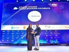 Saruni Maina, AVP, Stablecoins Segment at Flutterwave, receiving the Cross-Border Payments award at the Africa Tech Summit Awards in Nairobi, Kenya.