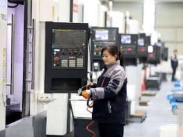 Aluminum chassis for new energy vehicles are manufactured inside a production workshop in Huaibei, east China's Anhui province. (Photo by Li Xin/People's Daily Online)