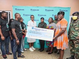 Head Of Public Relations At Prudential Bank Bennet Frimpong Presenting The Cheque To The Acting Head Of The Paediatric Department Of Military Hospital Dr Sheila Asamoah Okyere