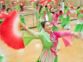 Senior citizens take a dancing lesson in a senior university in Suqian, east China's Jiangsu province. (Photo by Xu Jianghai/People's Daily Online)