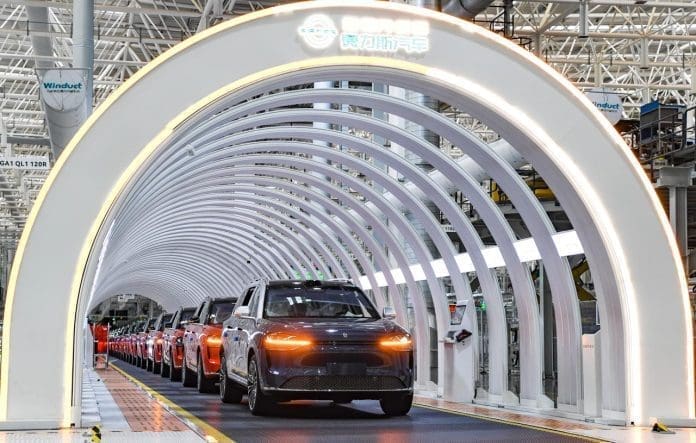 Finished new energy vehicles are pictured at Seres Group's super factory in Liangjiang New Area, Chongqing, southwest China, June 7, 2024. (Xinhua/Wang Quanchao)
