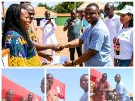 CEO Of PIWAK, Dr. Prince Nelson Mortoti (Right), Presenting Cash Support To Tongu Food Victims Through MPs & MDCEs