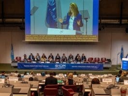IOM Director General Amy Pope delivers remarks as representatives from Member States attend the 36th Standing Committee on Programmes and Finance (SCPF) in Geneva. Photo: IOM