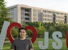 Abdulkhakimov Jaloluddin , a master's student from Uzbekistan, stands on the campus of Jiangsu University, fulfilling a three-generation dream of friendship with China that began with his grandfather during World War II. (Photo provide by Abdulkhakimov Jaloluddin)