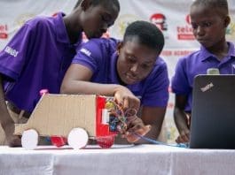 A team of students demonstrate how their built project, an automatic rain sensing car wiper system, works at the DigiTech Academy graduation ceremony in Tarkwa