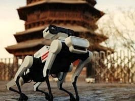 Photo shows a robotic dog operating in front of Sakyamuni Pagoda of Fogong Temple, well known as the Wooden Pagoda of Yingxian County, Shuozhou, north China's Shanxi province.