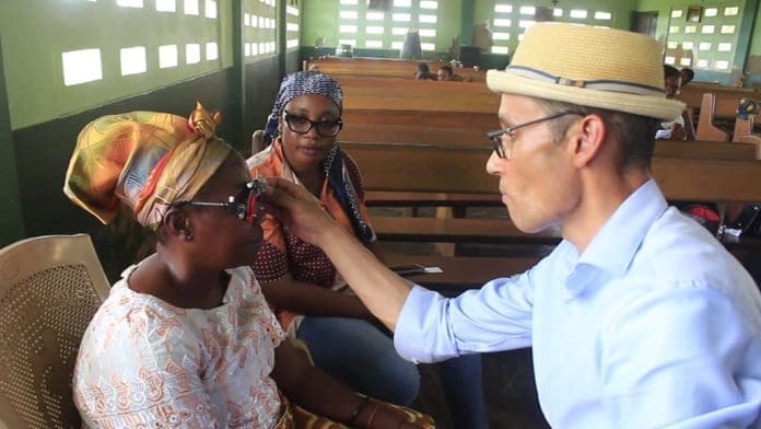 Dr. Johannes Schoonhoven (Right), Attending To One Of The Adzato Residents Dr. Johannes Schoonhoven (Right), Attending To One Of The Adzato Residents